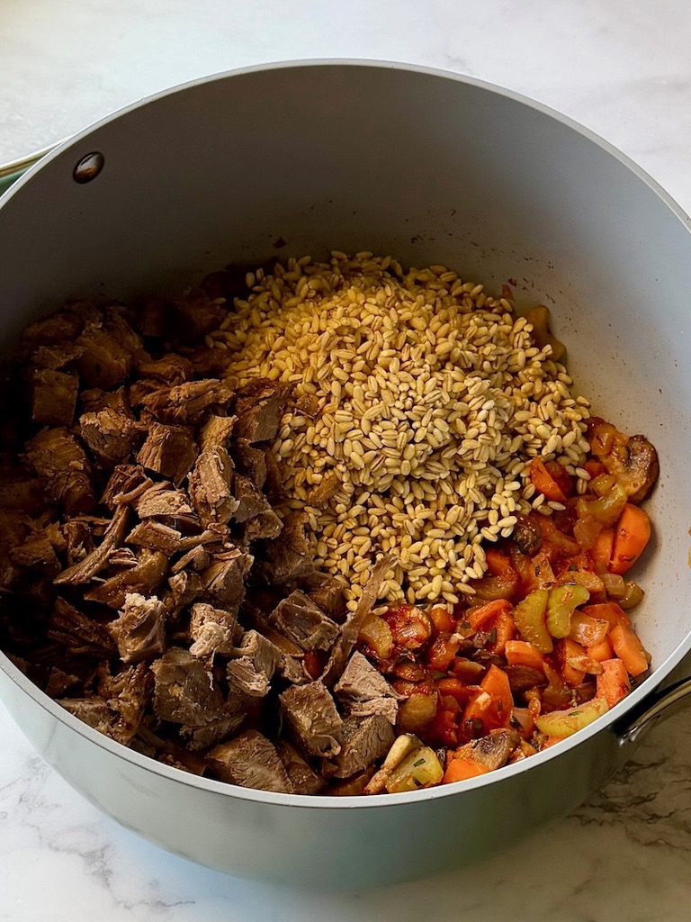 Pearl barley and leftover roast beef added to the pot