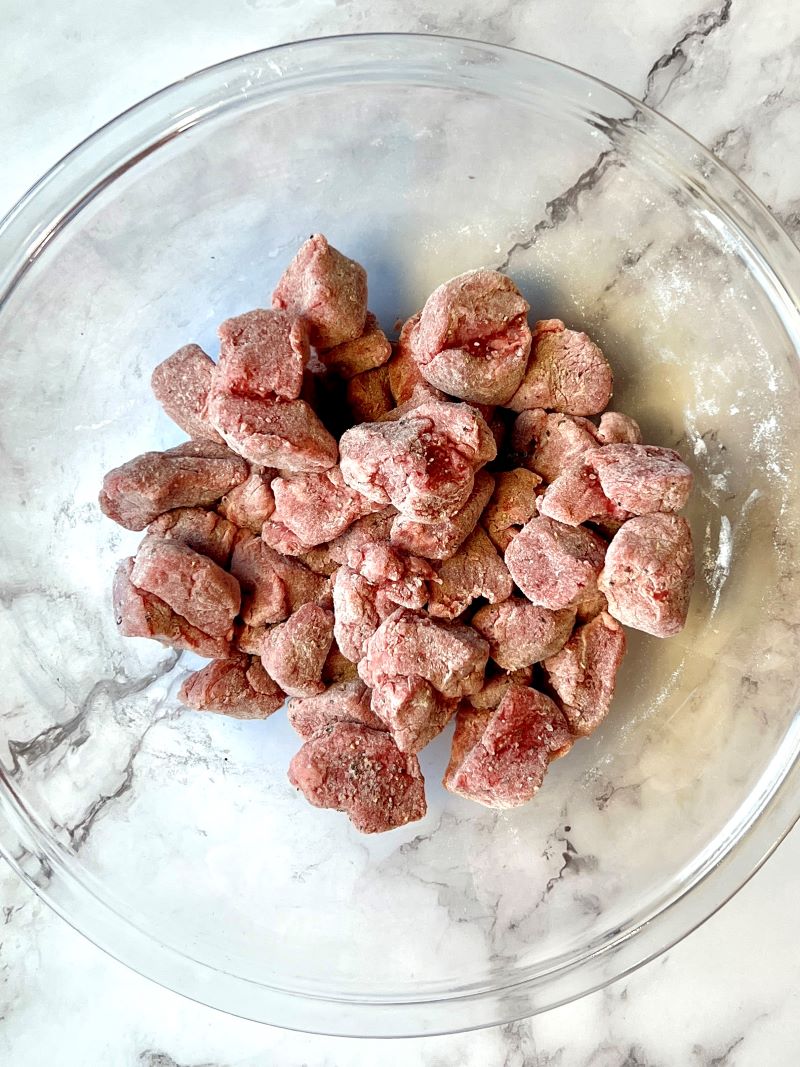 Beef chunks coated in flour, salt and pepper