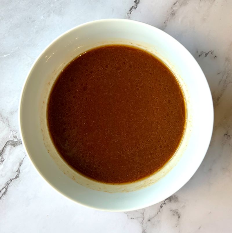 Sauce ingredients mixed in a small bowl. 