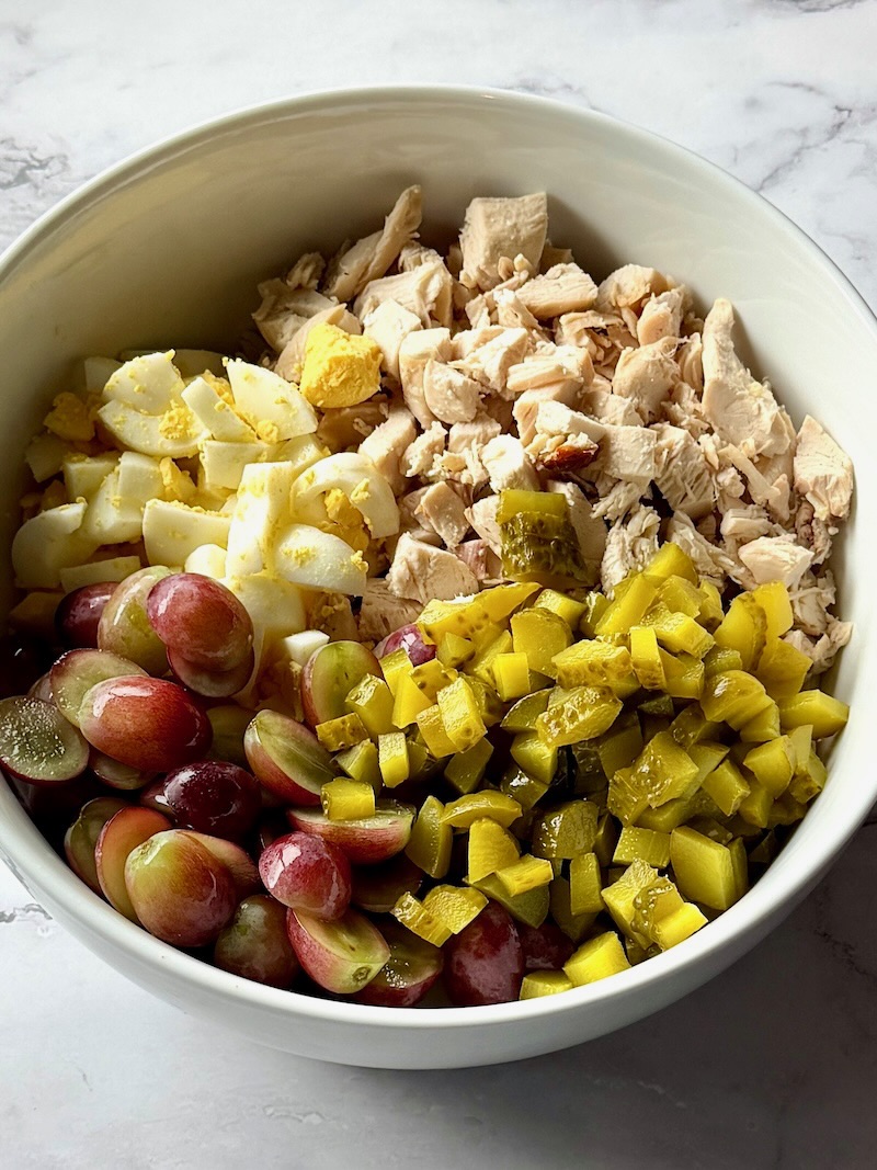 Chicken salad ingredients in a serving bowl