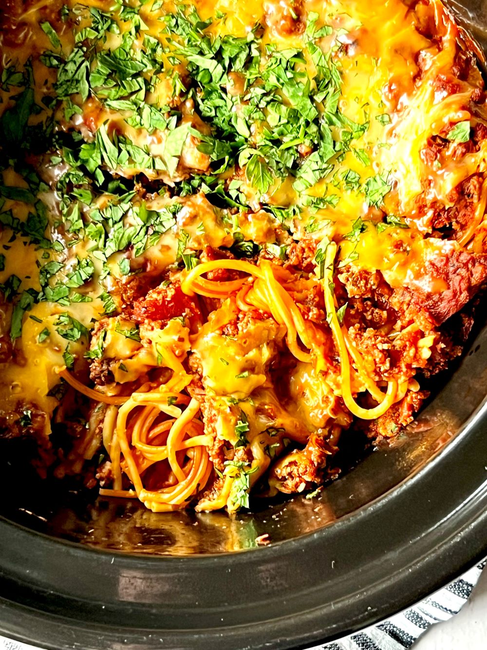 Showing noodles and meat sauce cooked in slow cooker