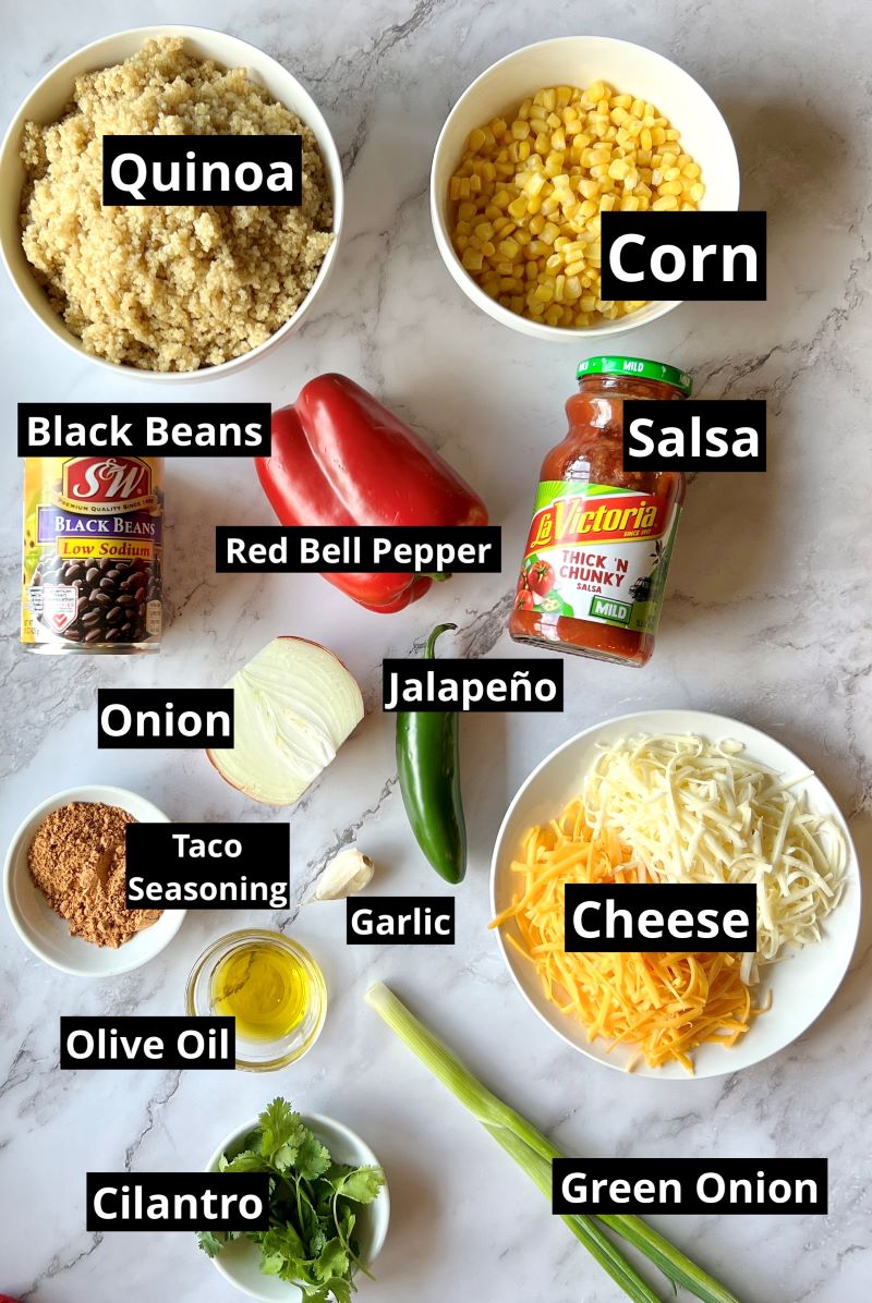 Ingredients for Mexican quinoa casserole. Cooked quinoa, corn, black beans, onions, bell pepper, jalapeno, garlic, taco seasoning, salsa, olive oil, cheese, green onion, and cilantro.