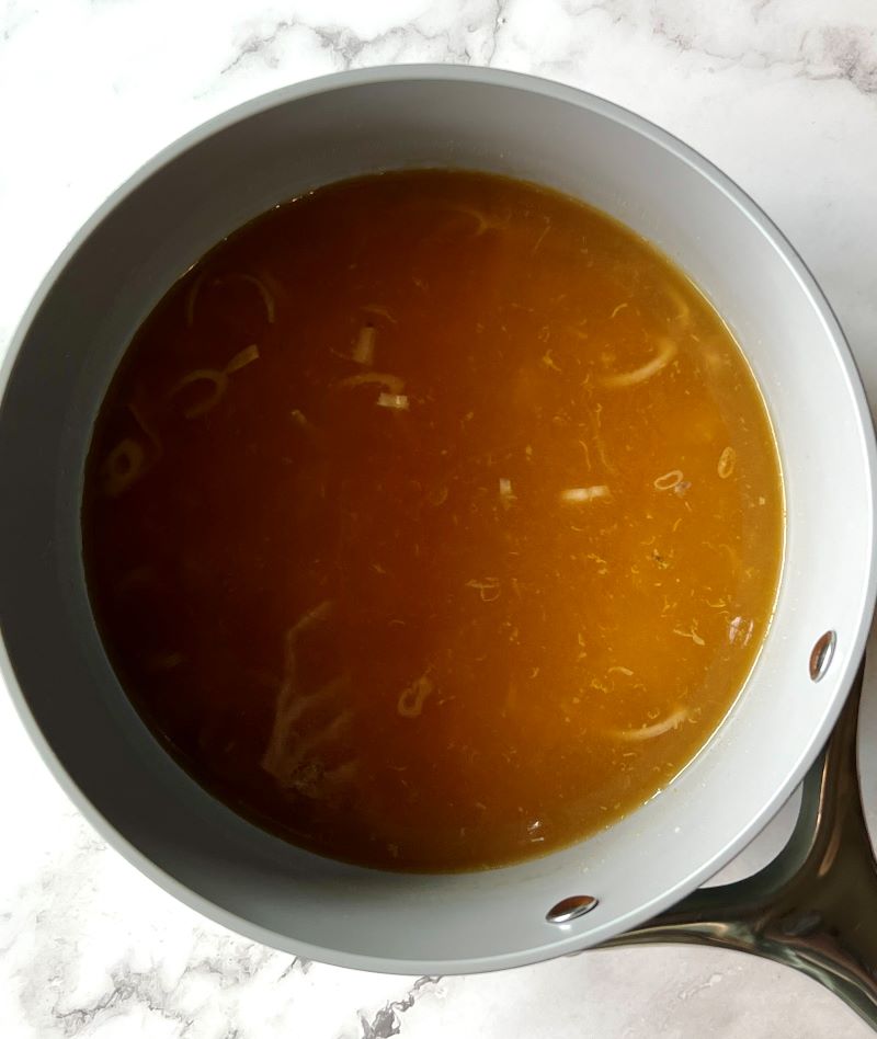 Sautéed shallots, white rice, vegetable stock and lemon zest.