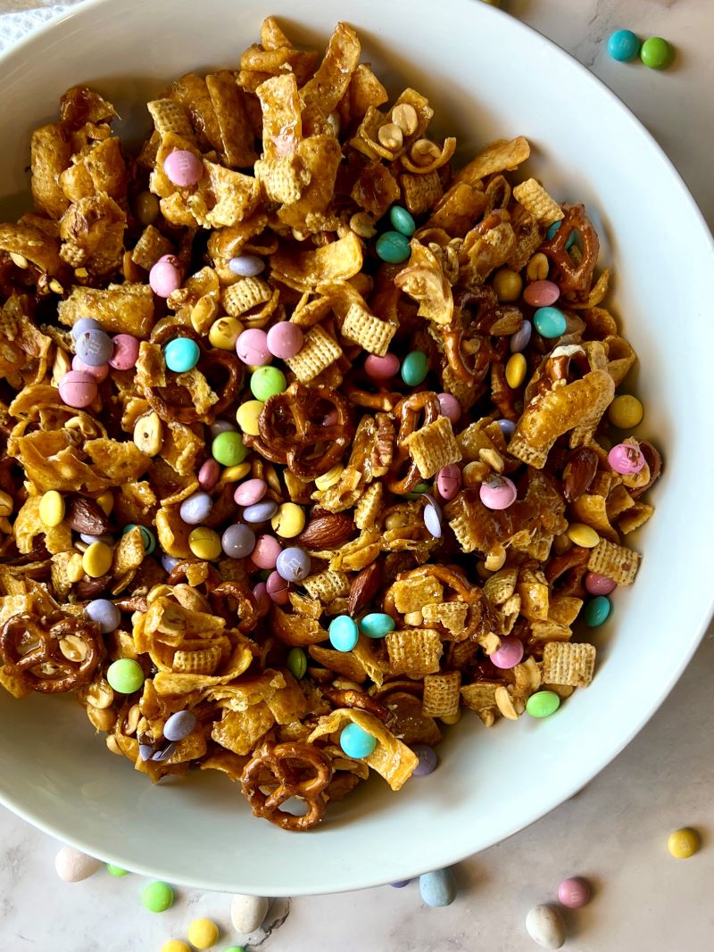 Baked party mix combined with M&M's.