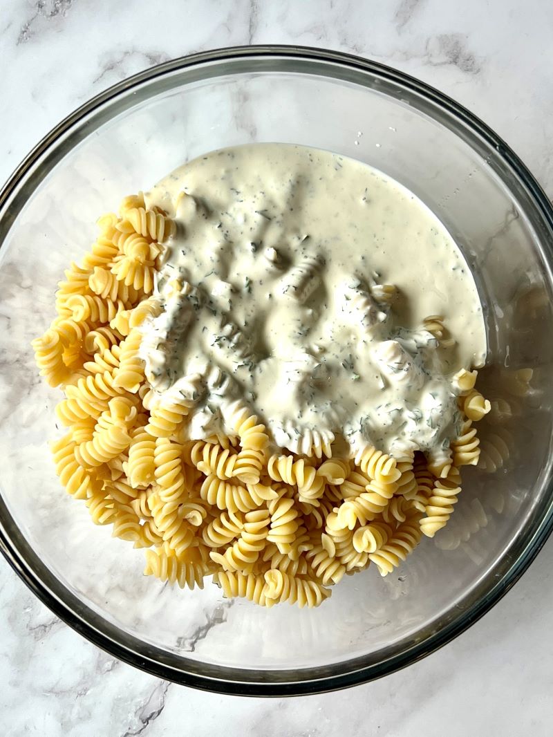 Cooked pasta combined with the buttermilk ranch dressing. 