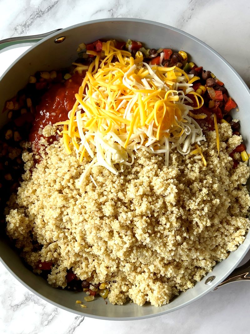 Stir in quinoa, salsa, and cheese.