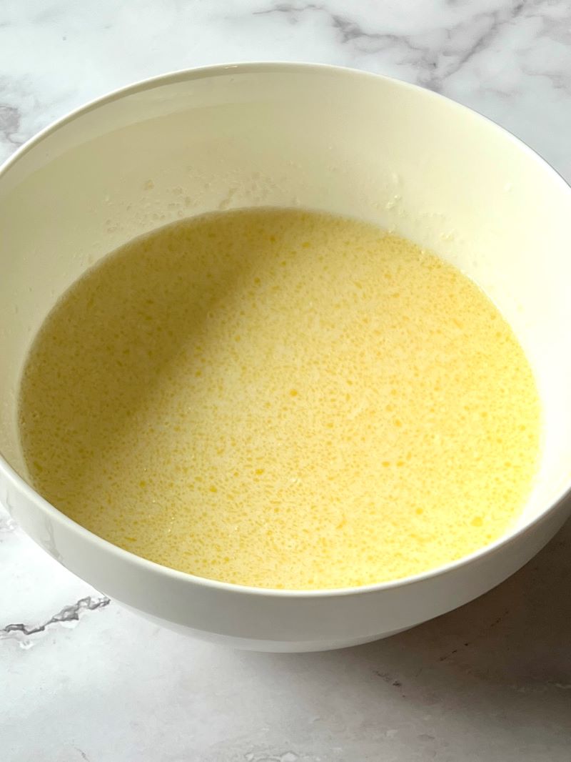 Wet ingredients mixed in a bowl.
