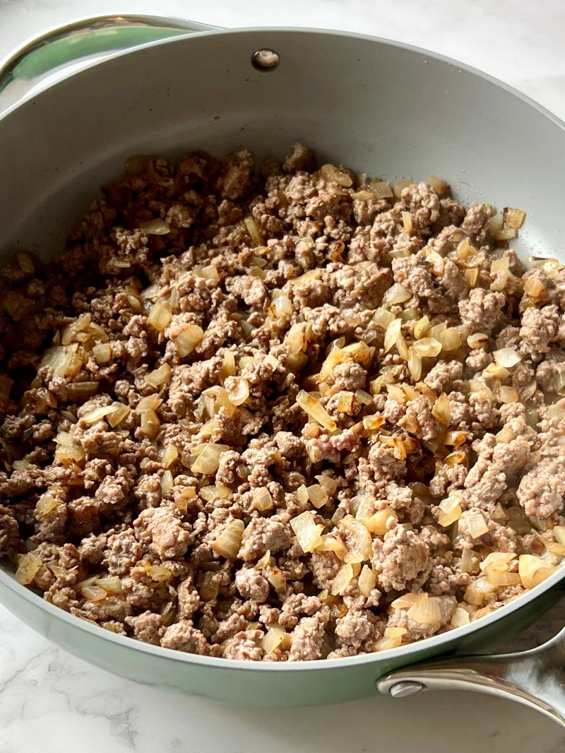 Cooked ground beef in a large skillet