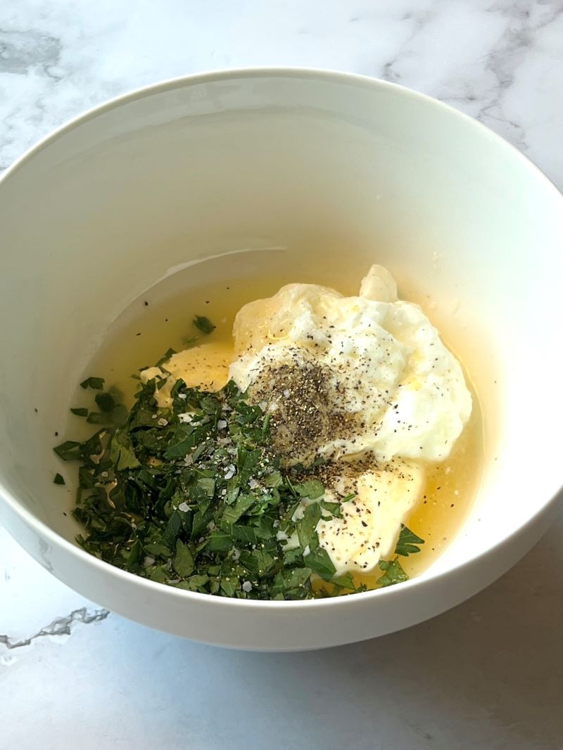 Dressing ingredients in a small bowl.