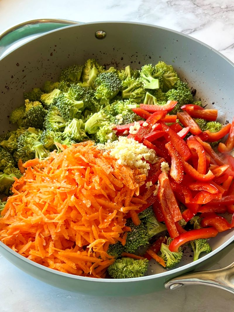 Sautéed veggies in a skillet. 