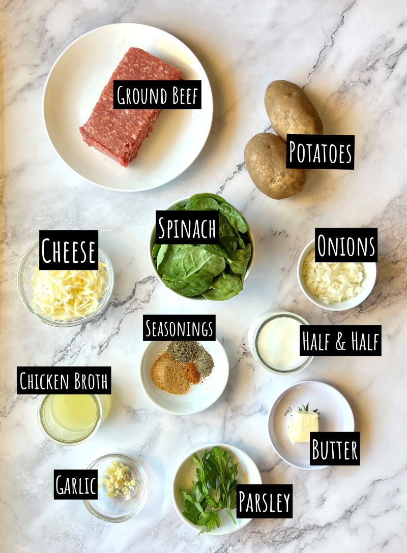 Ingredients displayed for one-pan ground beef and potatoes. Ground beef, russet potatoes, onions, spinach, cheese, seasonings, half and half, chicken broth, butter, garlic, and parsley.