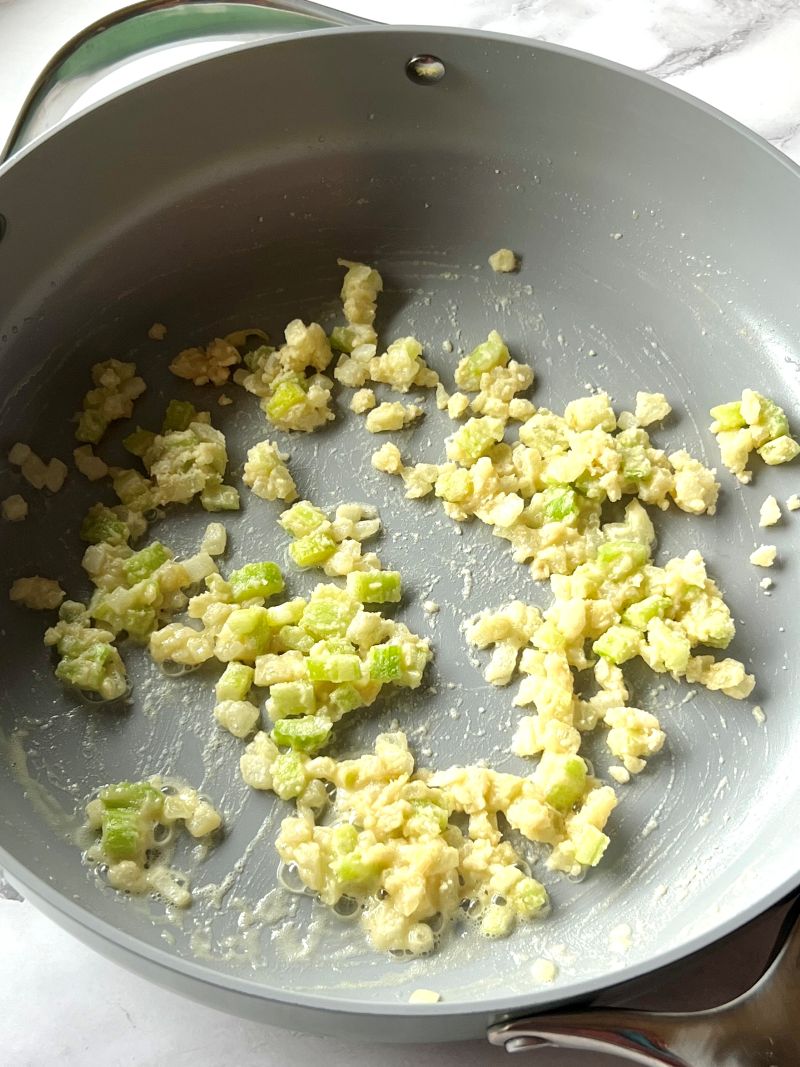 Cooked onions and celery with butter and olive oil and flour in a large skillet.