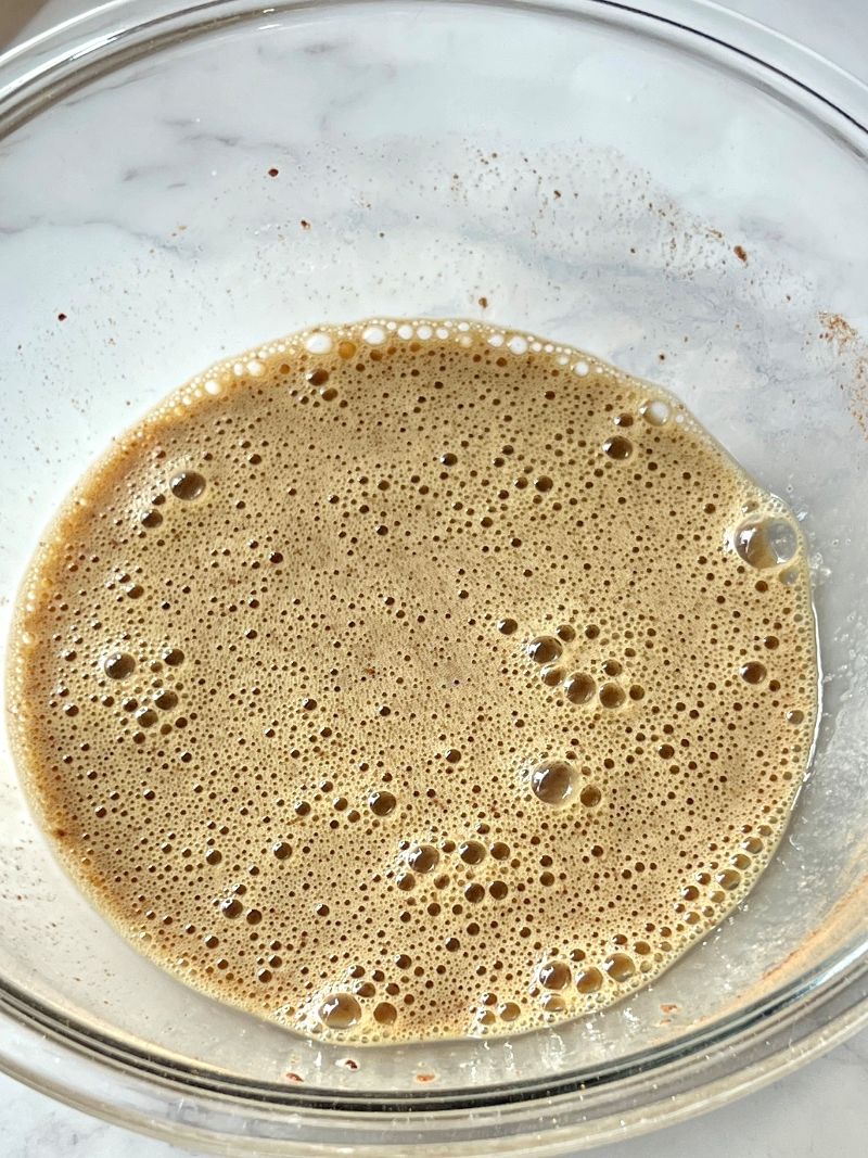 Eggs whisked with milk, cinnamon, nutmeg, salt, vanilla extract and maple extract in a medium bowl. 