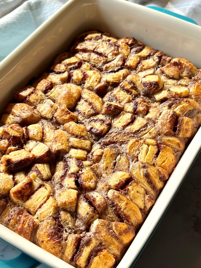 Cinnamon rolls baked in baking dish.