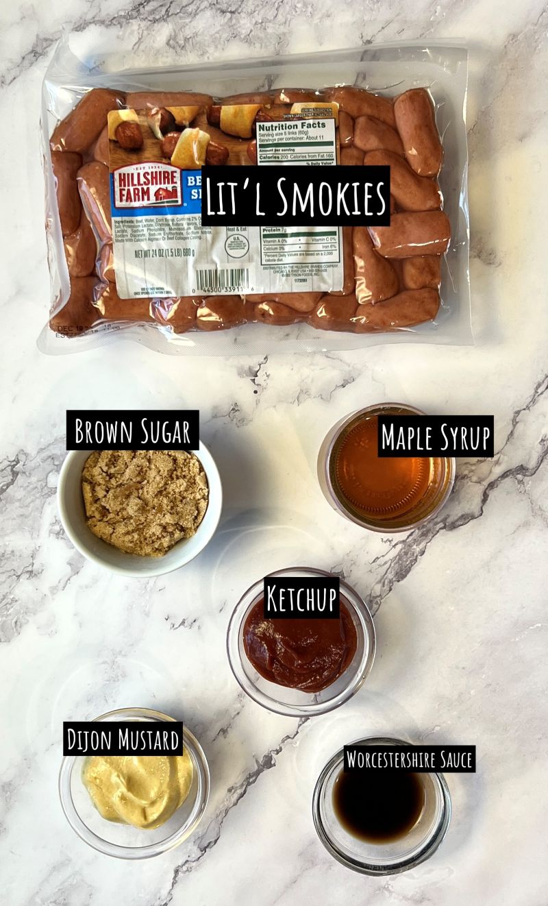 Ingredients displayed for slow cooker maple brown sugar little smokies. Little smokies, brown sugar, maple syrup, ketchup, Dijon mustard, Worcestershire sauce.