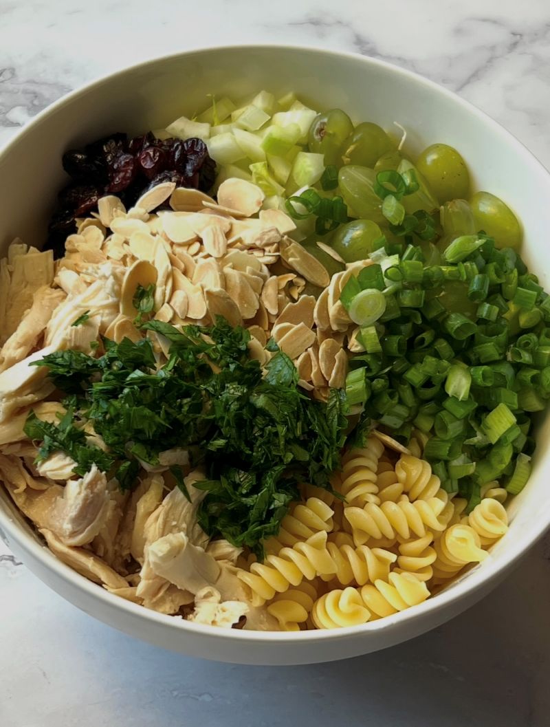 Salad ingredients assembled in a bowl.