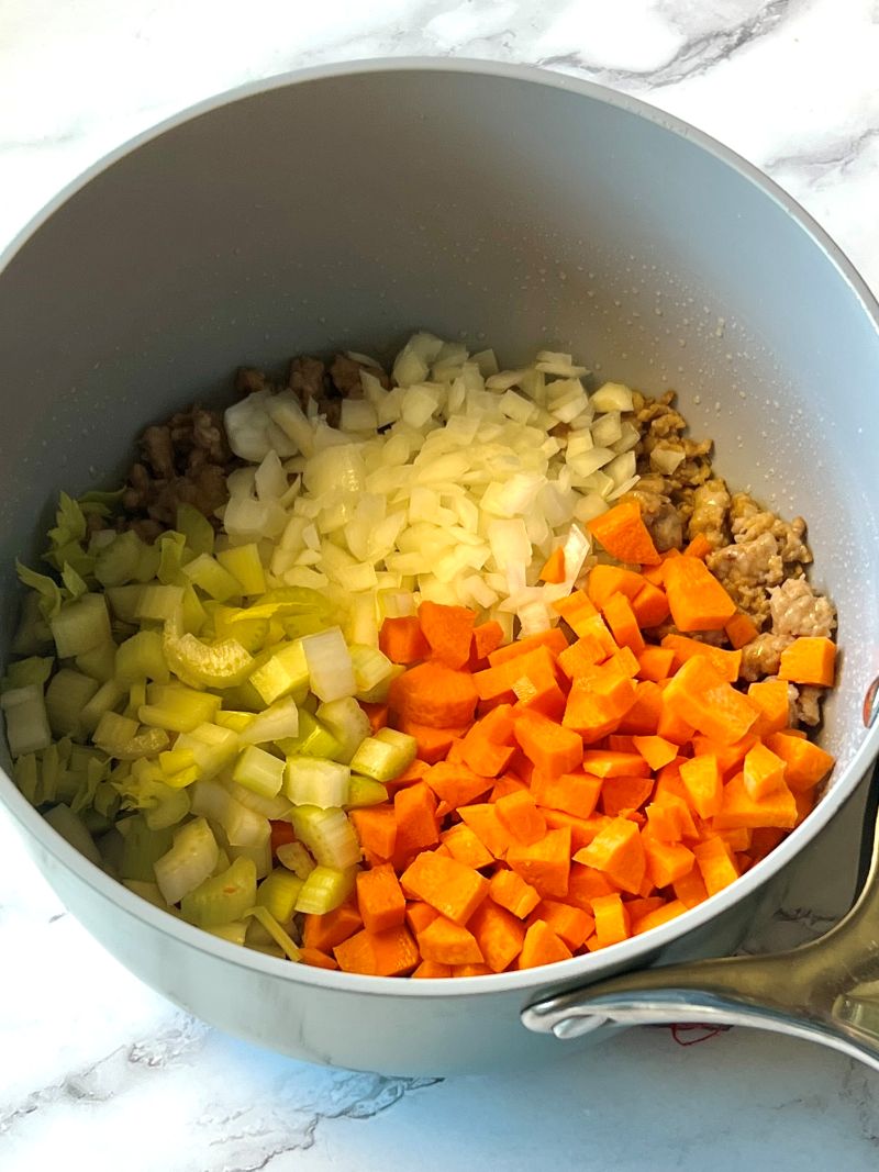 Onions, garlic, carrots, and celery added to the Italian sausage.