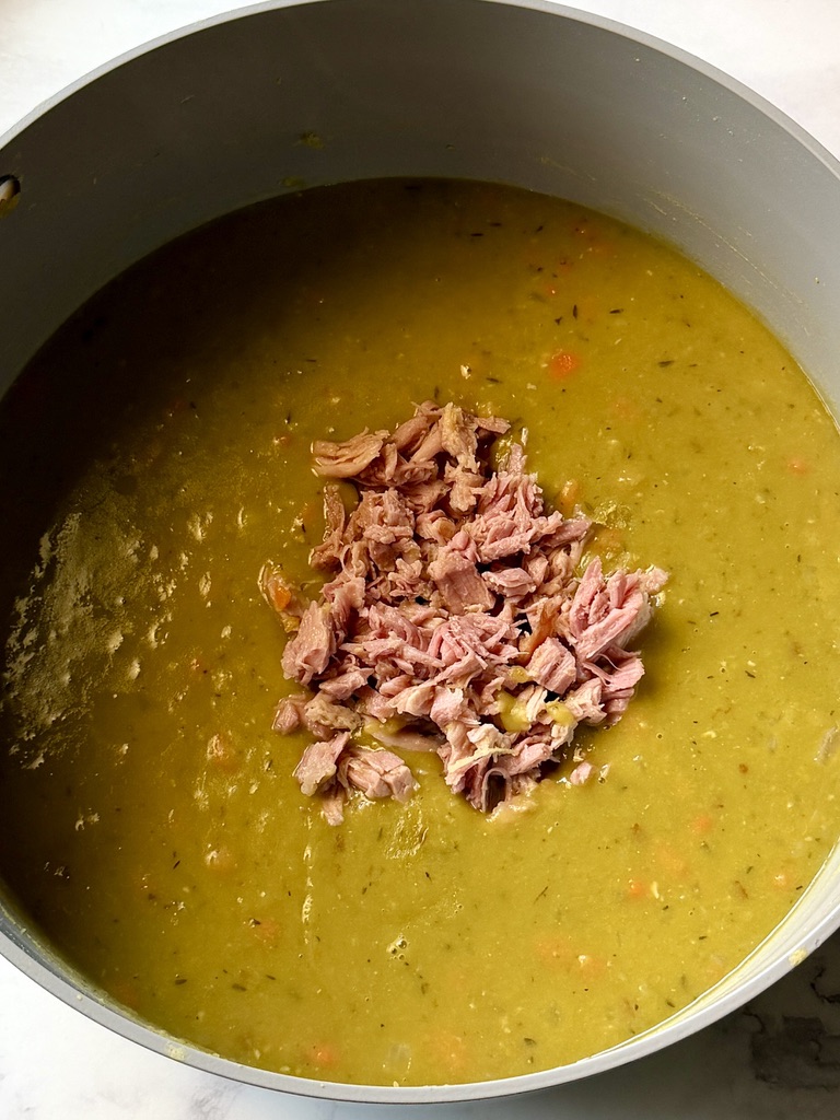 Ham mixed with the cooked split pea soup.