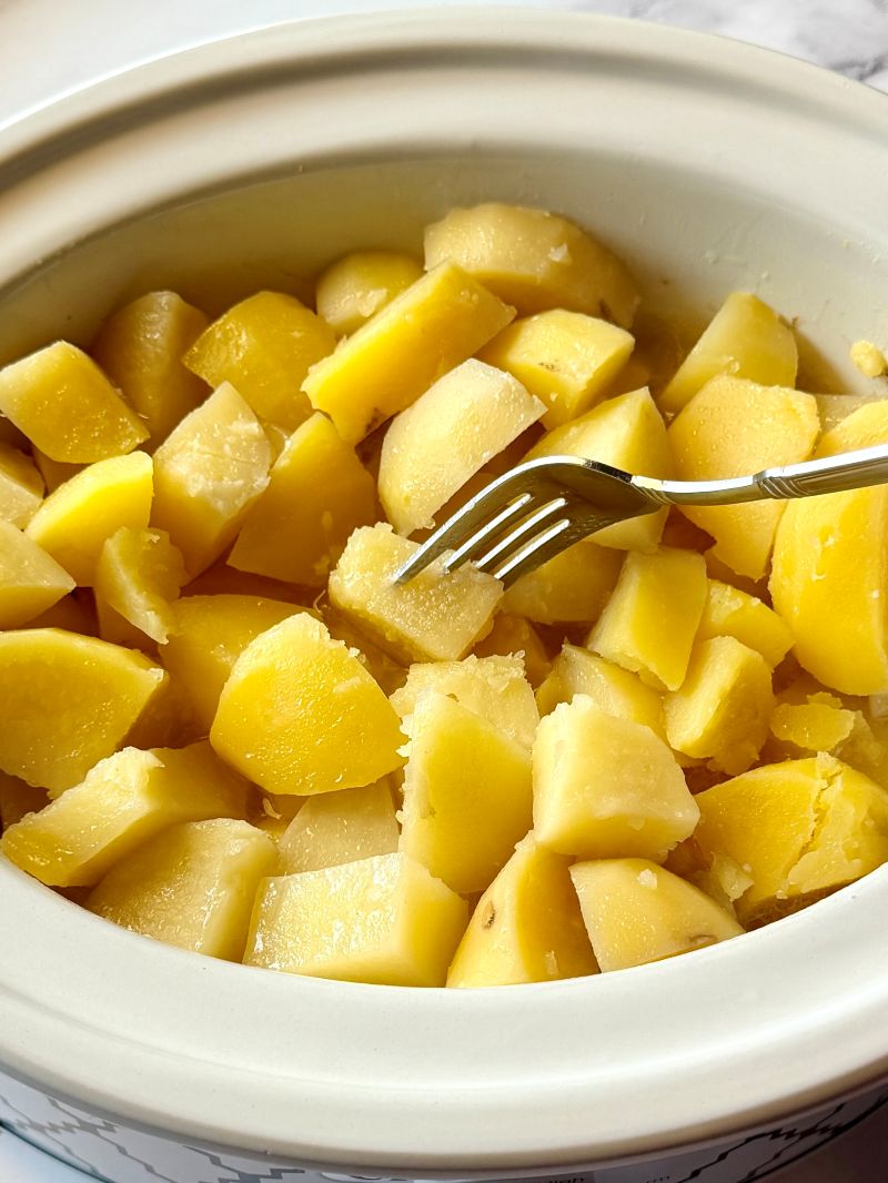 Cooked potatoes in the slow cooker.