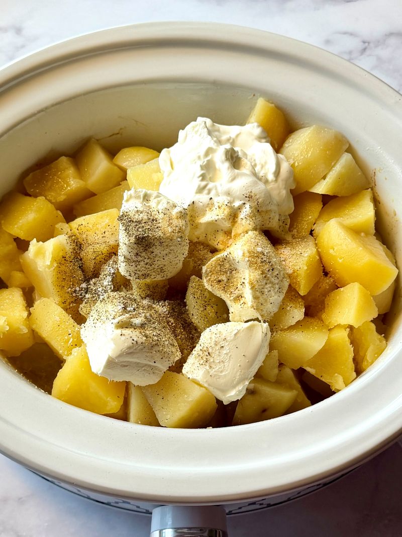 Cooked potatoes combined with cream cheese, sour cream, and seasonings. 