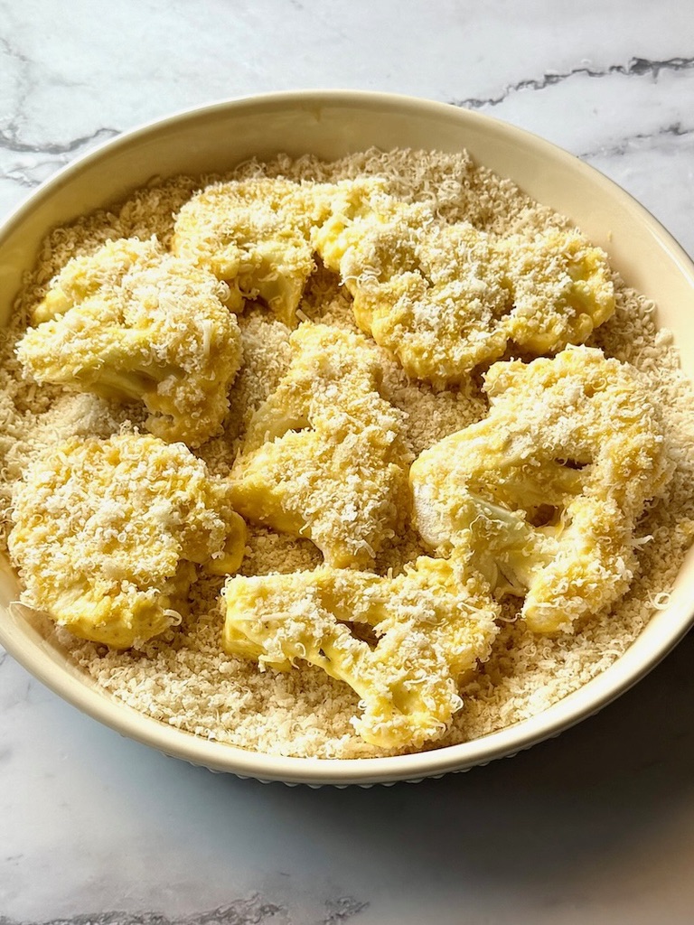 cauliflower pieces coated with panko and parmesan cheese