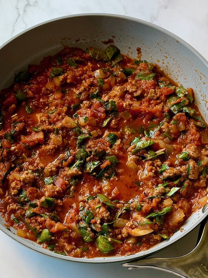 Meat sauce cooked in a skillet