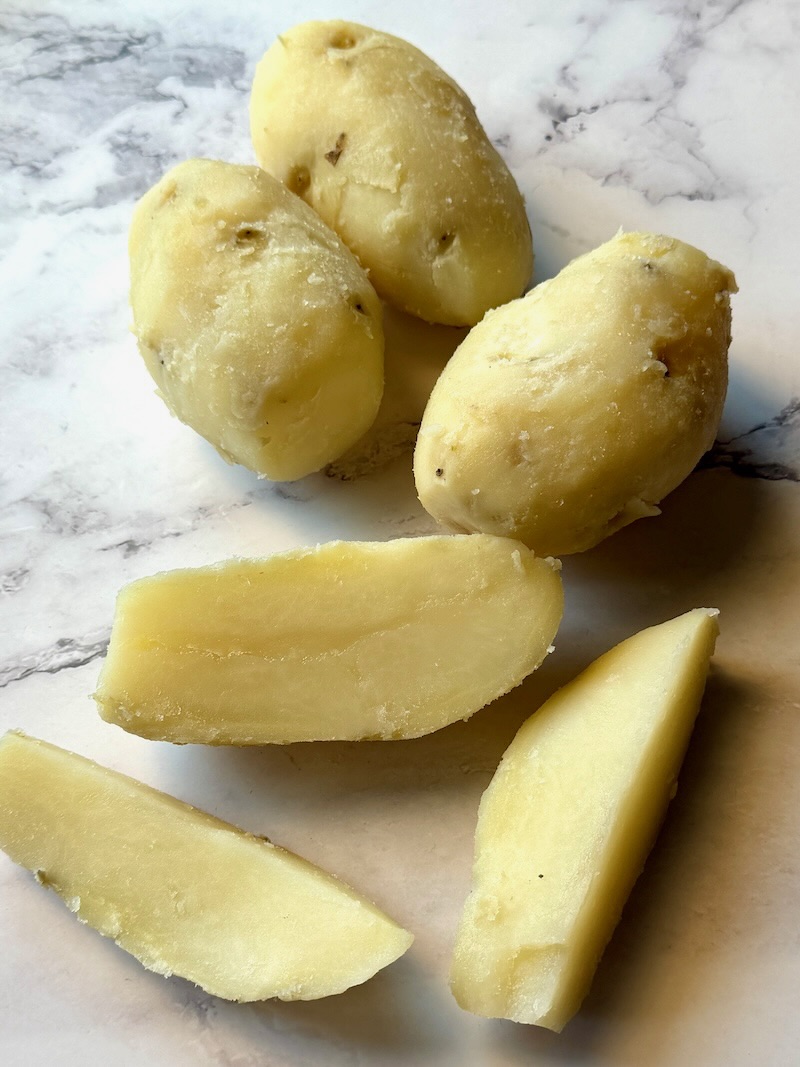 Cooked and peeled russet potatoes