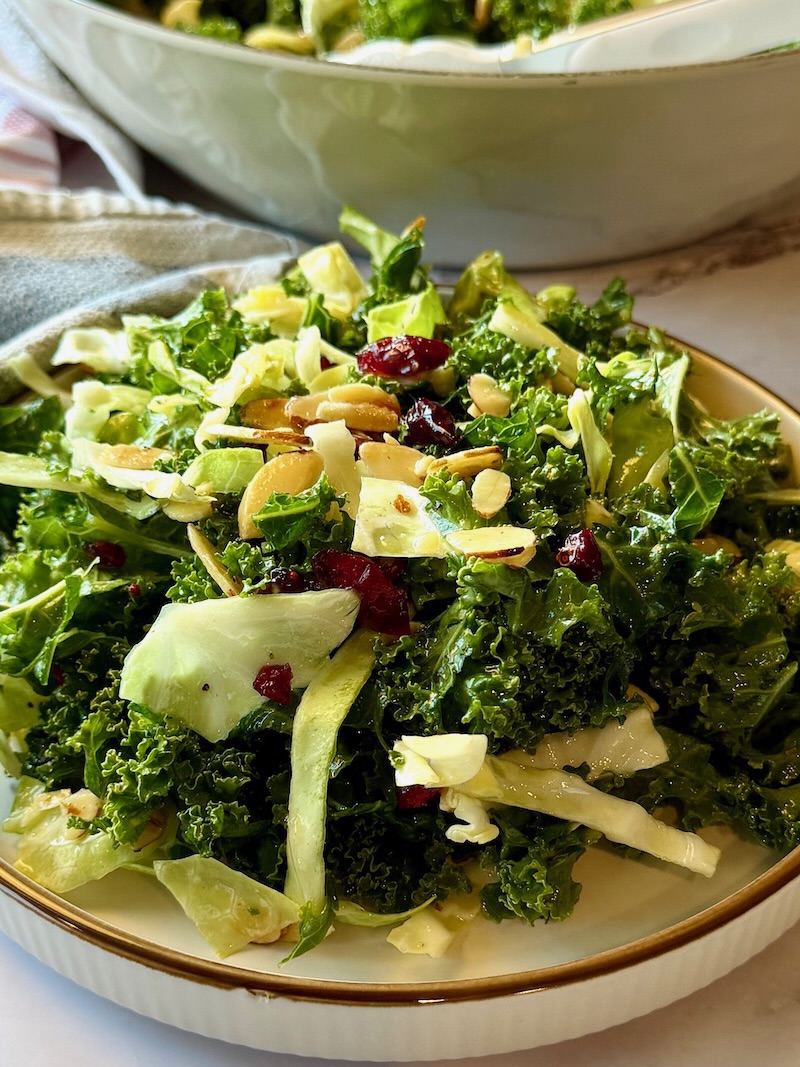 Kale crunch salad plated on a serving plate.