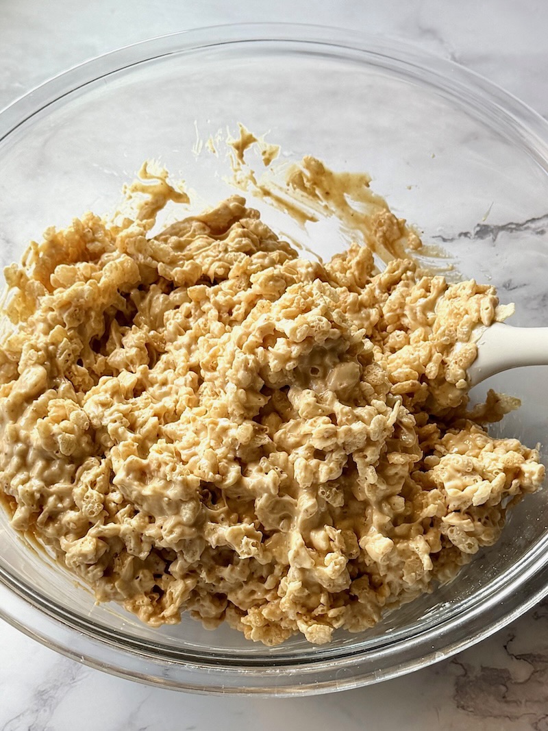 Melted chocolate and peanut butter combined with rice krispies. 
