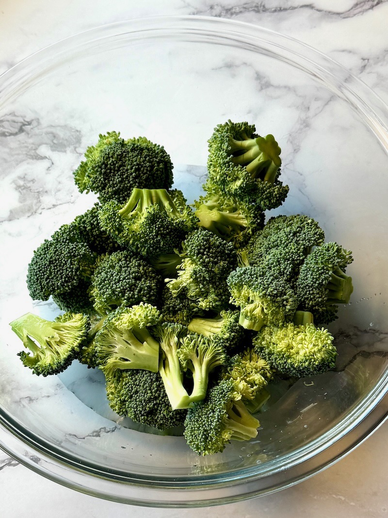 Steamed broccoli in a bowl.