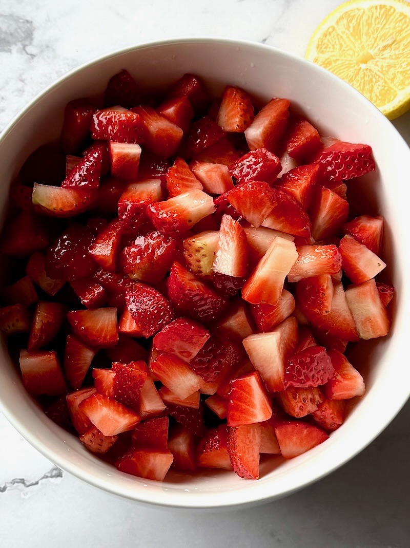 Strawberries mixed with lemon juice and vanilla extract. 
