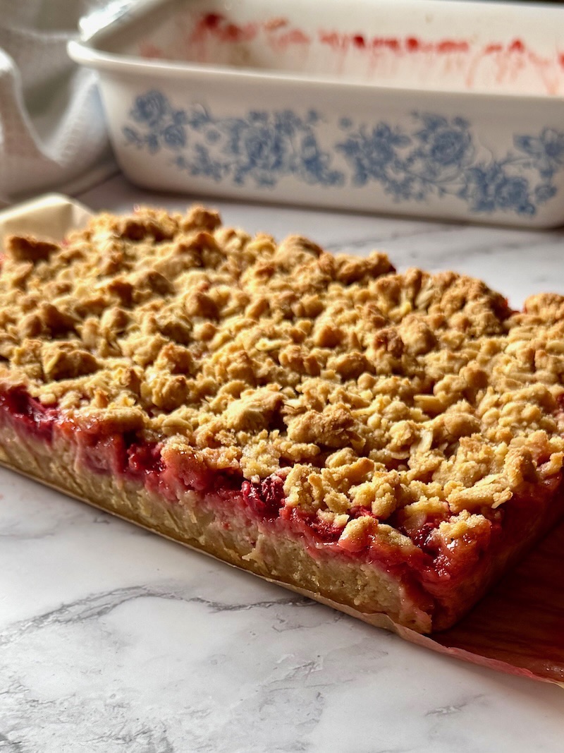 Strawberry crumble bars baked and removed from the pan.