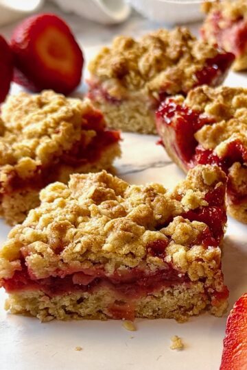 Strawberry crumble bars cut into squares
