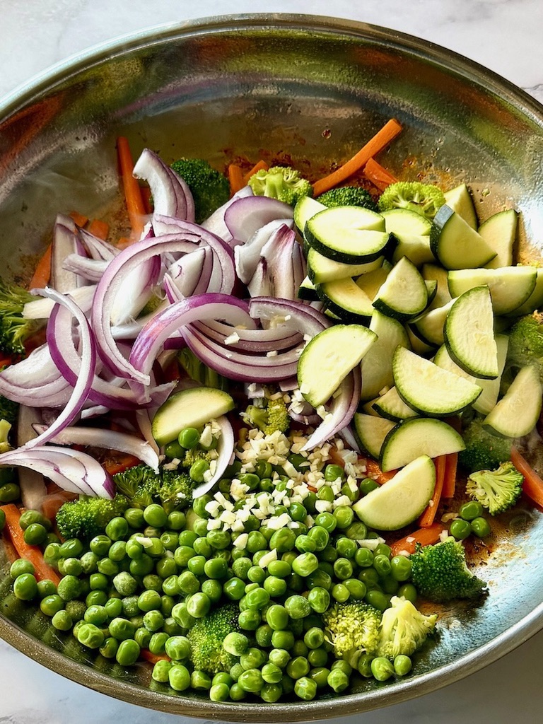 Remaining veggies added to the skillet with the broccoli and carrots.
