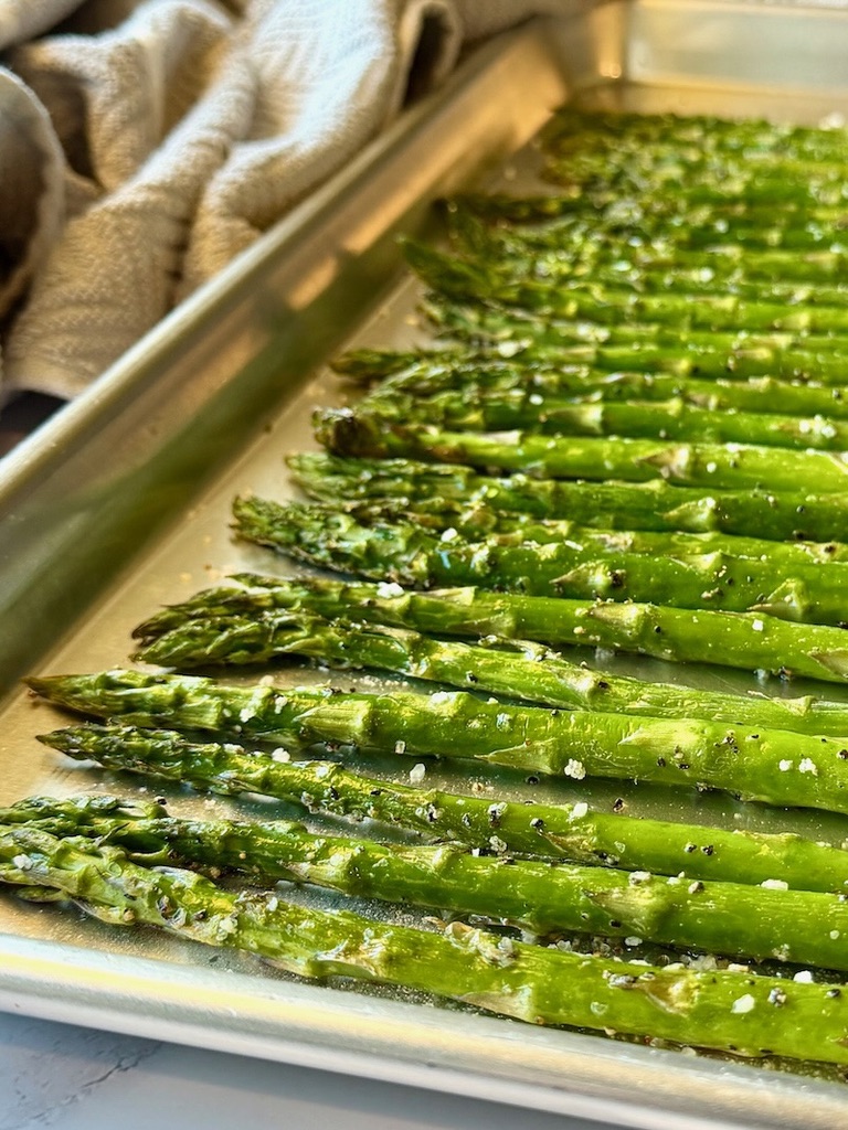 Asparagus roasted on a sheet pan.