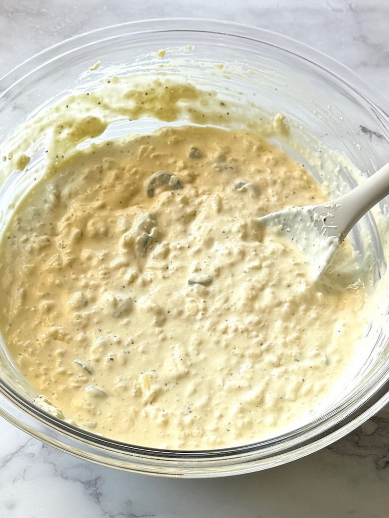Sour cream sauce combined in a mixing bowl