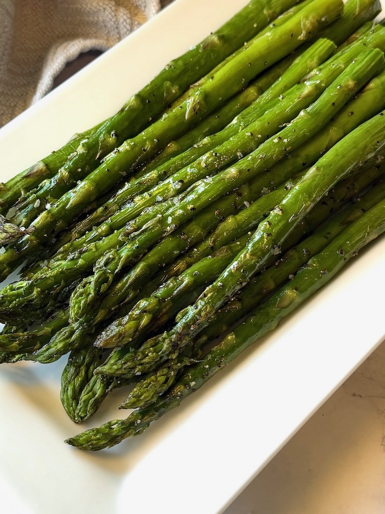 Roasted asparagus on a serving platter