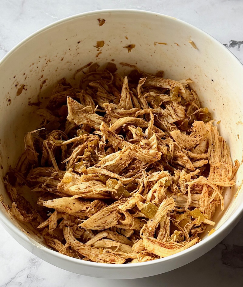 Shredded chicken combined with green chilis and seasonings. 