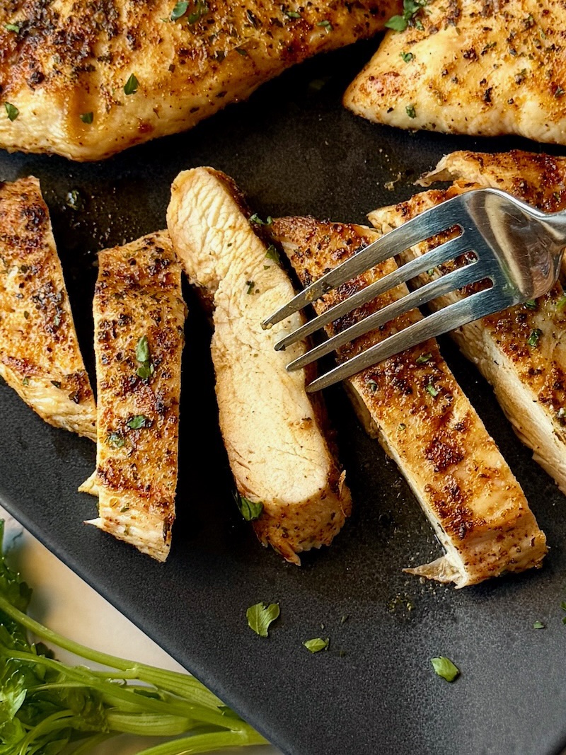 Grilled chicken breast sliced in slices