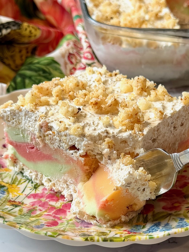 Mom's Sherbet Dessert on a plate with a fork.