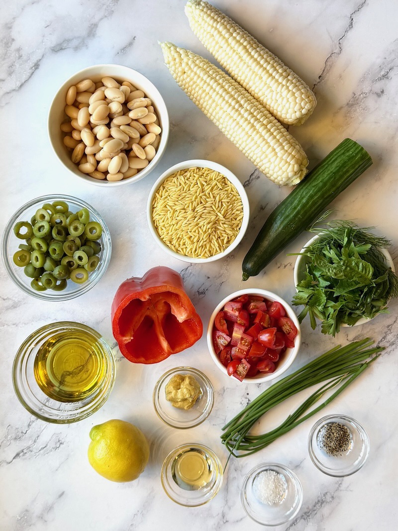 Ingredients displayed for summer glow orzo salad