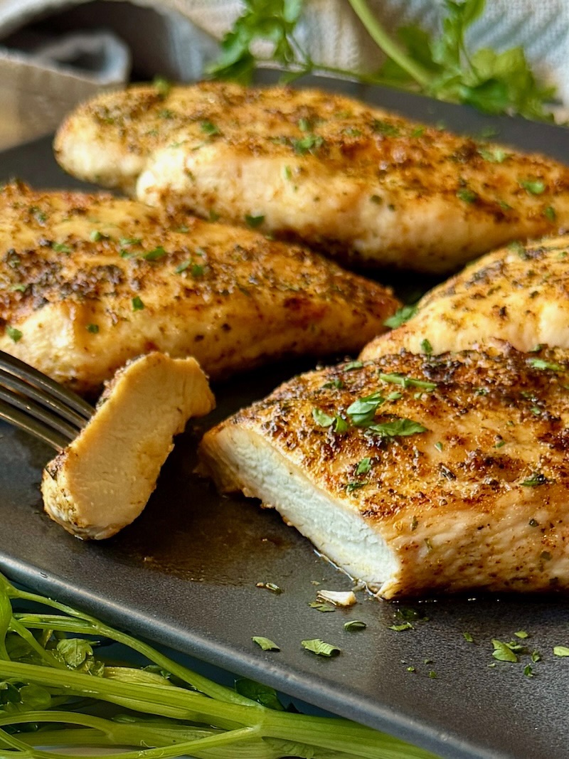 Simple grilled chicken breasts cut in slices.