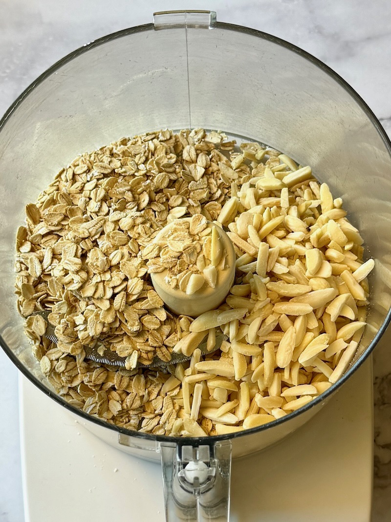 almonds and oats in a food processor.
