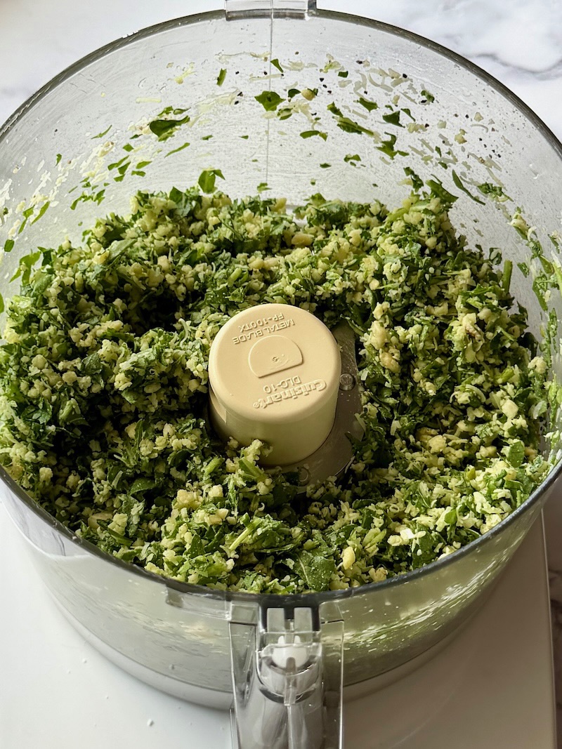 Blended arugula in the food processor. 