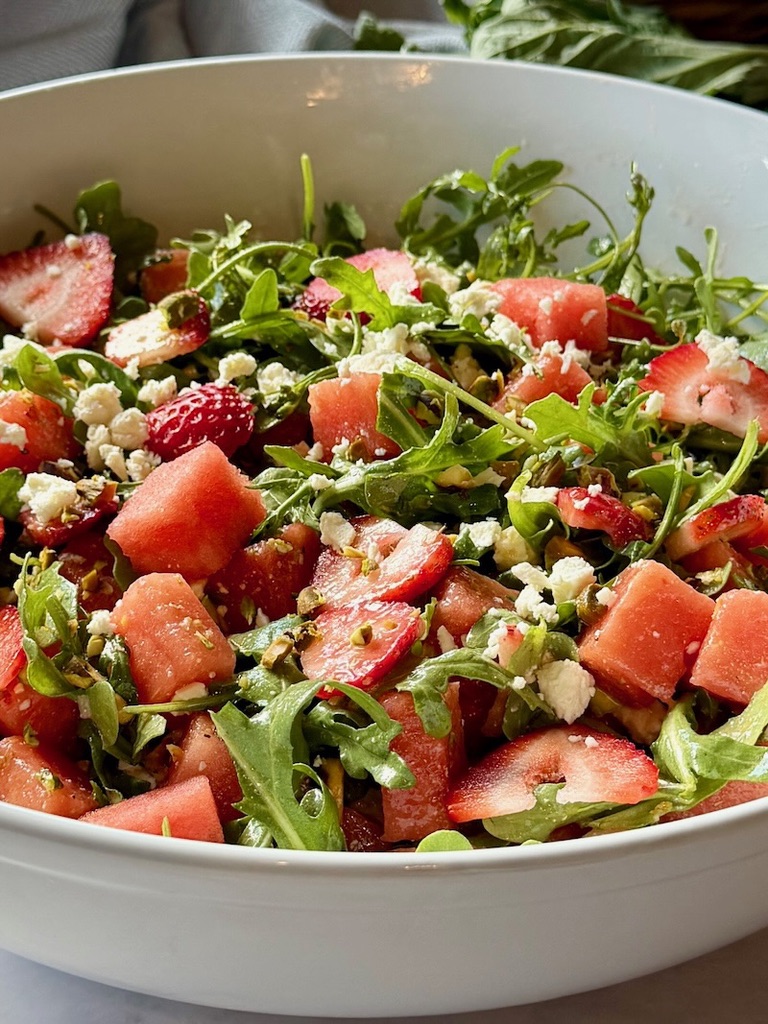 Strawberry watermelon salad assembled in a serving bowl. 
