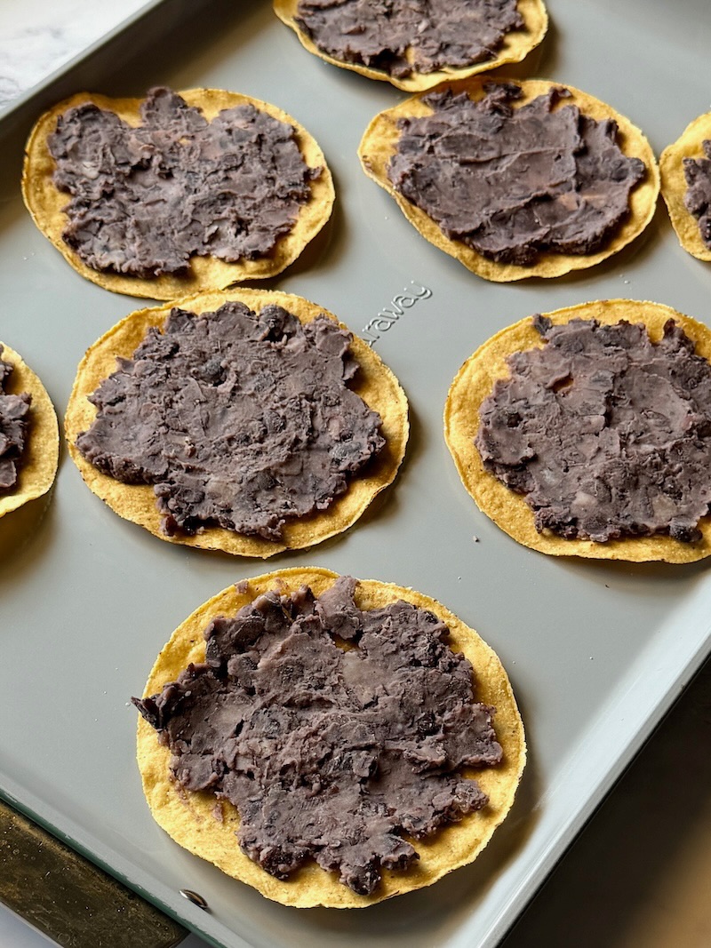 Black beans spread on tostadas