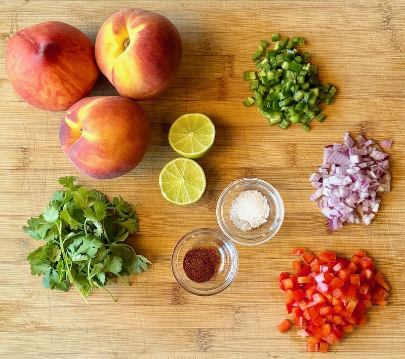 ingredients displayed for grilled peach salsa