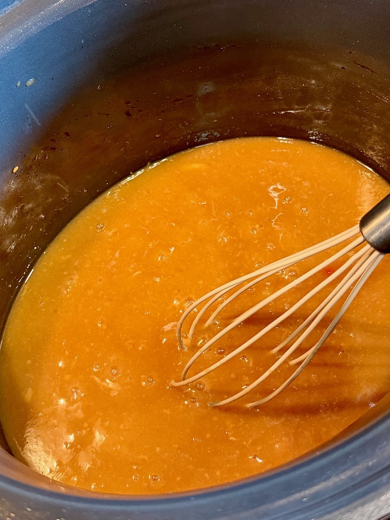 Sauce in the slow cooker thickened with corn starch. 