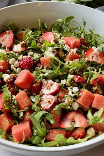 Strawberry watermelon salad assembled in a large serving bowl.