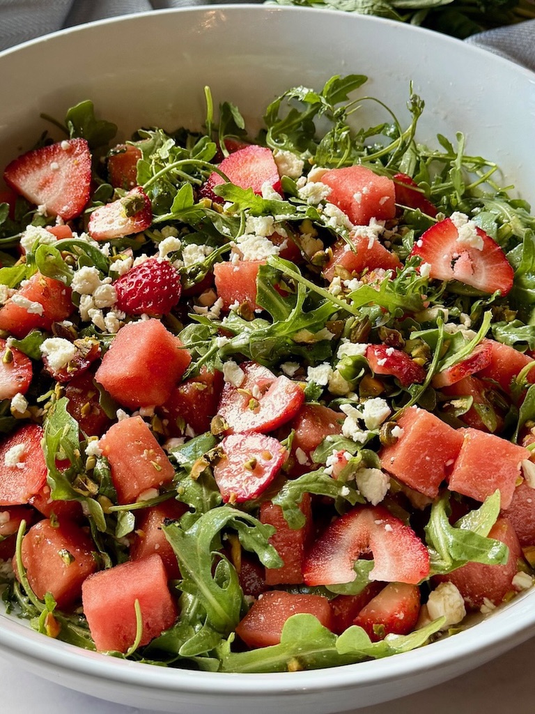 Strawberry watermelon salad assembled in a large serving bowl.
